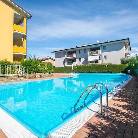 Garden Residence Appartamento Con Terrazzo E Piscina 代森扎诺-德尔加达 外观 照片