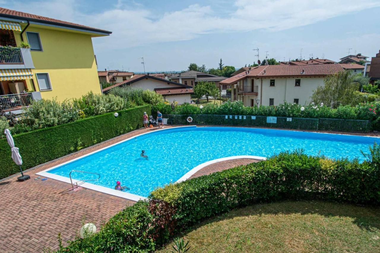 Garden Residence Appartamento Con Terrazzo E Piscina 代森扎诺-德尔加达 外观 照片