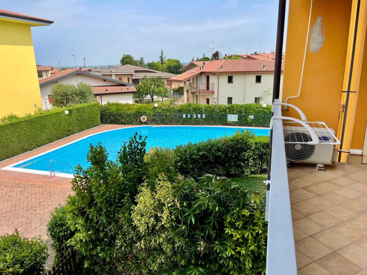 Garden Residence Appartamento Con Terrazzo E Piscina 代森扎诺-德尔加达 外观 照片